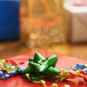 Royalty Free Photo of Presents Wrapped and Decorated With Bows on a Table