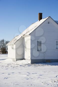 Royalty Free Photo of a Rural House in Snow