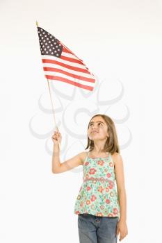 Royalty Free Photo of a Girl Holding an American Flag