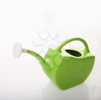 Royalty Free Photo of a Green Plastic Watering Can