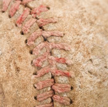 Royalty Free Photo of Stitching on a Dirty Worn Baseball