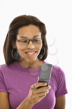 Royalty Free Photo of a Woman Text Messaging on a Cellphone