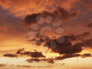 Royalty Free Photo of Fluffy Clouds at Sunset