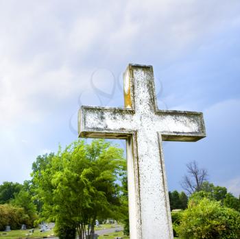 Royalty Free Photo of a Cross in the Graveyard