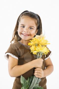 Royalty Free Photo of a Girl Holding a Bouquet of Flowers