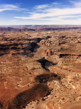 Aerial view of an arid, craggy landscape. Vertical shot.