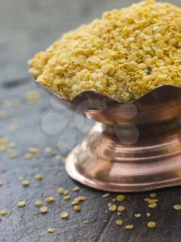 Royalty Free Photo of a Dish of Yellow Mustard Seeds