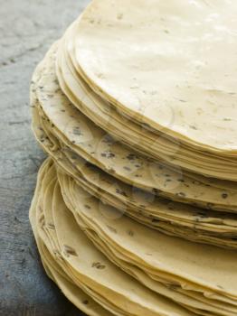 Royalty Free Photo of a Stack of Unccooked Papadoms