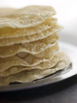 Royalty Free Photo of a Stack of Cooked Papadoms