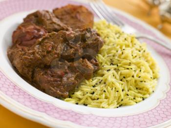 Royalty Free Photo of a Meat Vindaloo With Pilau Rice