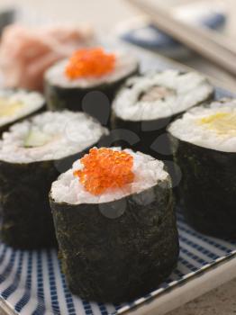 Royalty Free Photo of Small Rolled Sushi on a Plate