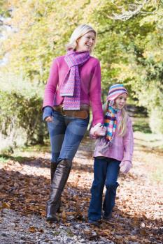 Royalty Free Photo of a Woman and Child in a Park