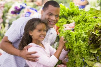 Royalty Free Photo of a Father and Daughter Shopping