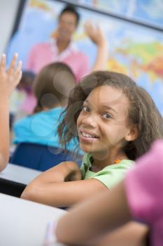 Royalty Free Photo of a Student Looking Backwards in Class