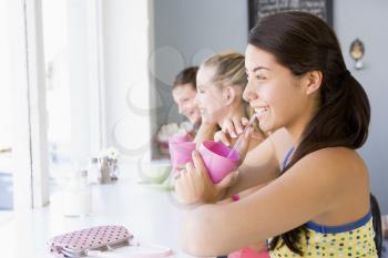 Royalty Free Photo of Women Filling Up on Soda