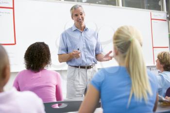 Royalty Free Photo of a Teacher in Class