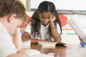 Royalty Free Photo of Students Reading