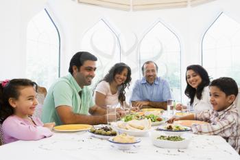 Royalty Free Photo of a Family at a Dinner Table