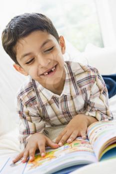 Royalty Free Photo of a Boy Reading