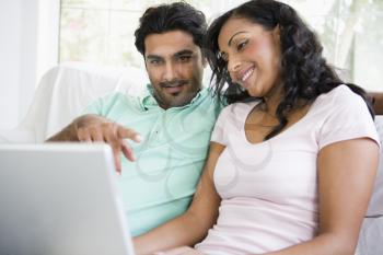 Royalty Free Photo of a Couple With a Laptop