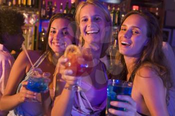 Royalty Free Photo of Young Women in a Bar