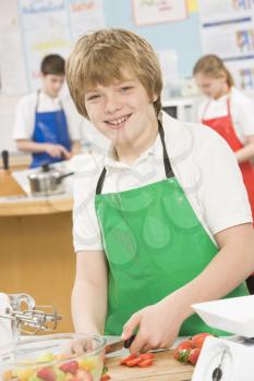 Royalty Free Photo of a Student in Cooking Class