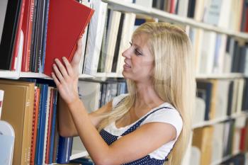 Royalty Free Photo of a Girl in a Library