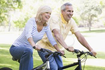 Royalty Free Photo of a Couple Biking