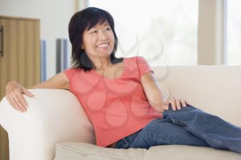 Royalty Free Photo of a Woman on a Couch