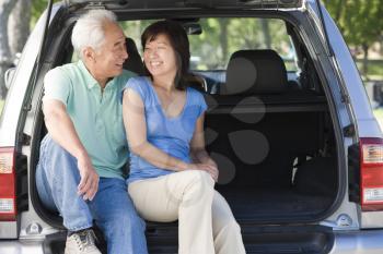 Royalty Free Photo of a Couple in the Back of a Van