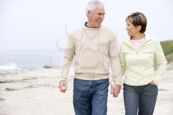 Royalty Free Photo of a Couple Walking on the Beach