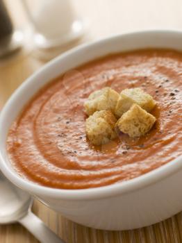 Royalty Free Photo of a Bowl of Tomato Soup with Croutons