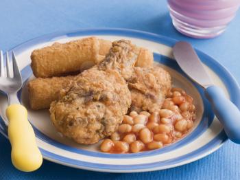 Royalty Free Photo of Southern Fried Chicken With Croquette Potatoes and Baked Beans