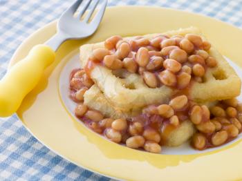 Royalty Free Photo of Potato Waffles with Baked Beans