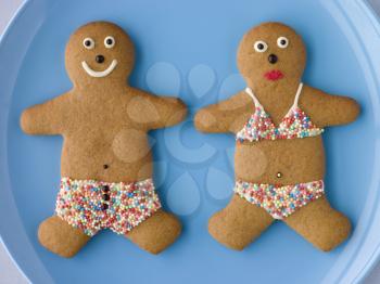 Royalty Free Photo of Gingerbread People With Sugar Candy Swimwear