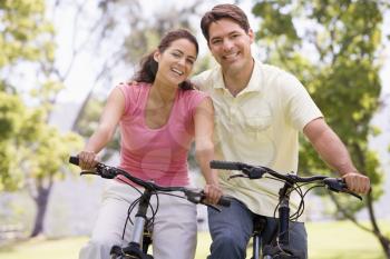 Royalty Free Photo of a Couple on a Bike