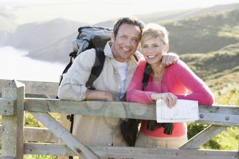 Royalty Free Photo of a Hikers at a Fence