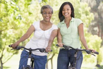 Royalty Free Photo of Two Women on Bikes