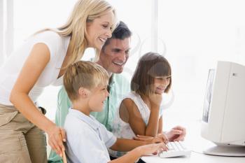 Royalty Free Photo of a Family at a Computer