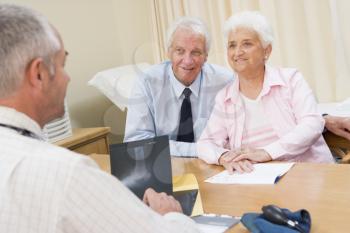 Royalty Free Photo of a Couple in a Doctor's Office