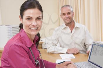 Royalty Free Photo of a Man at the Doctor