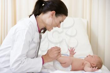 Royalty Free Photo of a Doctor With a Baby