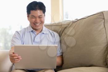 Royalty Free Photo of a Man With a Laptop