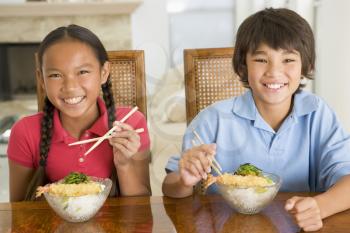 Royalty Free Photo of Children Eating Chinese Food