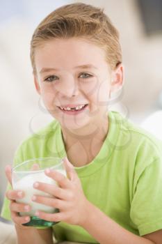 Royalty Free Photo of a Boy Drinking Milk