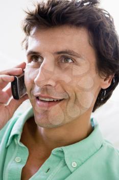 Royalty Free Photo of a Man Using a Cellphone