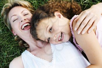 Royalty Free Photo of a Mother and Daughter on the Lawn