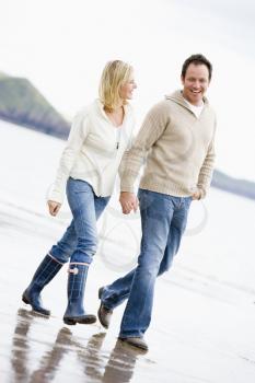 Royalty Free Photo of a Couple Walking on the Beach