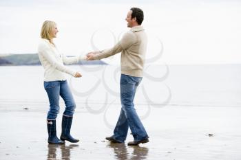 Royalty Free Photo of a Couple Walking on the Beach