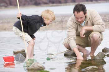 Royalty Free Photo of a Father and Son Fishing